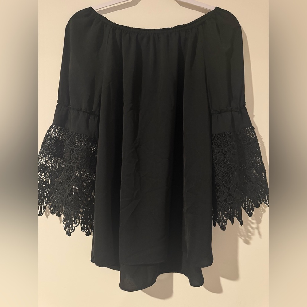 Black Garment with EST. 1946 Tag